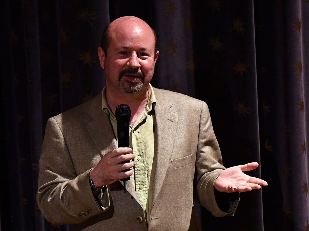The NY Screening Of The HBO Documentary “How To Let Go Of The World And All The Things Climate Can’t Change” Michael Mann speaks into a microphone