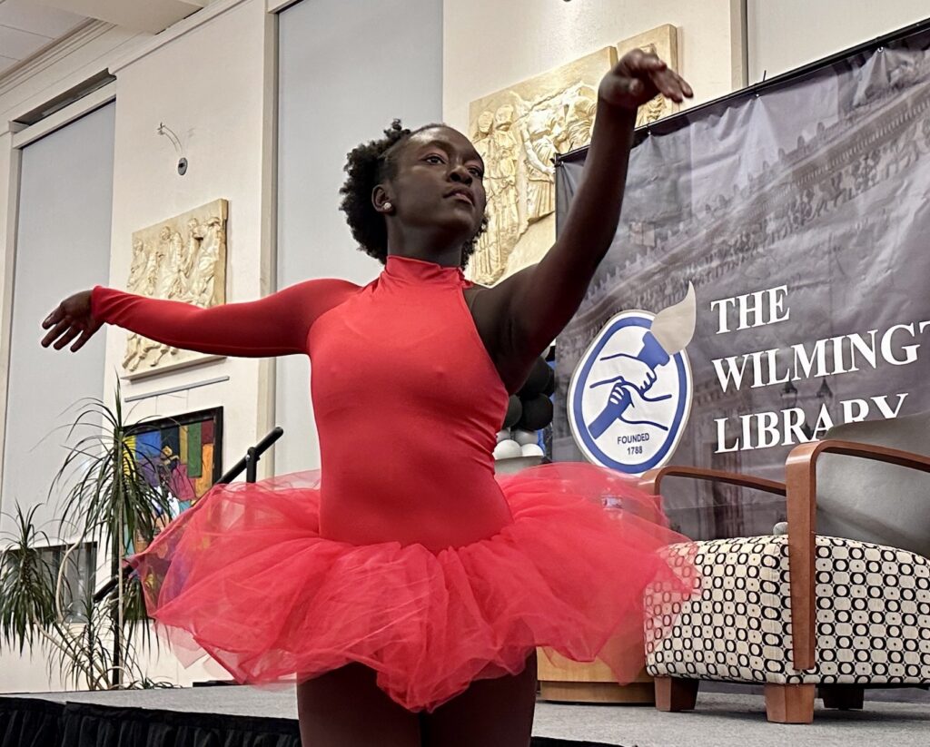 A ballet dancer performs at the event