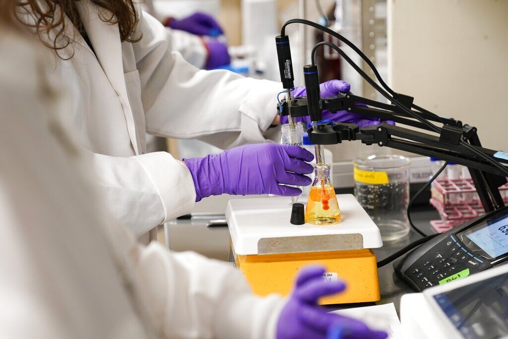 EPA Forever Chemicals Researchers test water samples in a lab