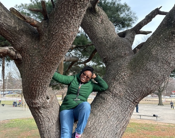 scavenger-hunt-4 A person poses for a photo in a tree.