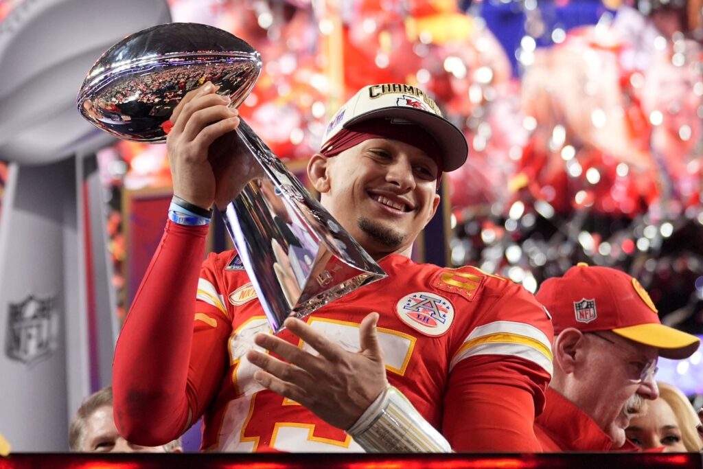 Super Bowl Football Kansas City Chiefs quarterback Patrick Mahomes celebrates with the trophy after the team's win in overtime during the NFL Super Bowl 58 football game against the San Francisco 49ers on Sunday, Feb. 11, 2024, in Las Vegas. The Chiefs won 25-22.