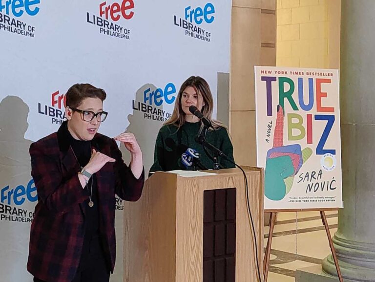 Sara Novic speaks at an event