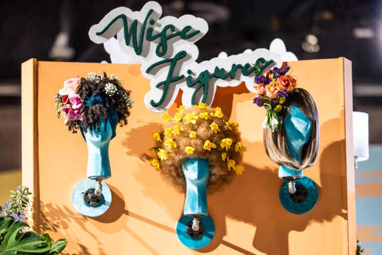 A community beauty salon and flower shop by Black Girl Florists at the 2024 Philadelphia Flower Show. (Kimberly Paynter/WHYY)