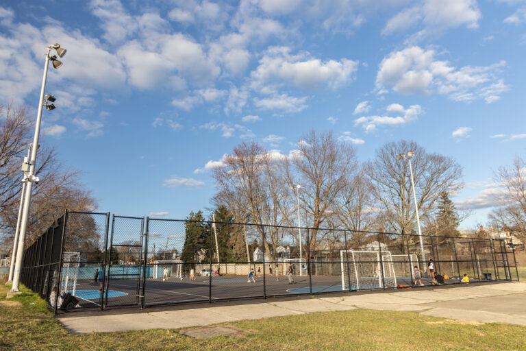 A court for soccer at a park on a sunny day