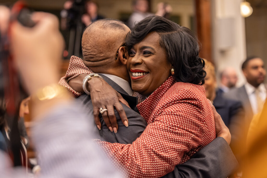 Cherelle Parker and Curtis Jones Jr. hugging