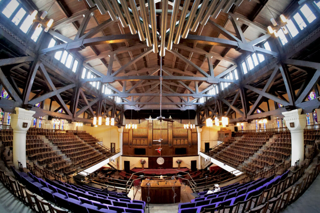 The pipes of the Tindley Temple organ are positioned in the front, back and corners of the sanctuary in order to surround the listener.