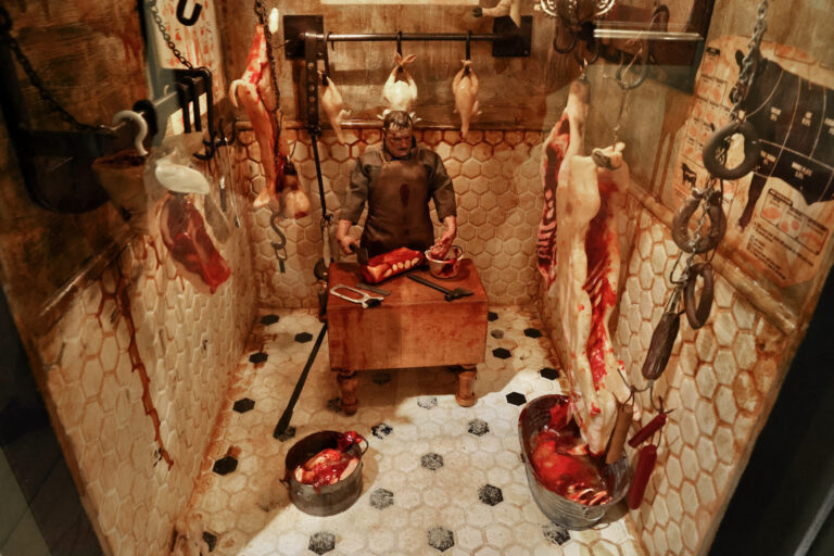 Jamie Wyeth's ''Butcher Shop'' tableau is part of ''Unsettled,'' an exhibit looking at the artist's darker work at the Brandywine Museum of Art. (Emma Lee/WHYY)