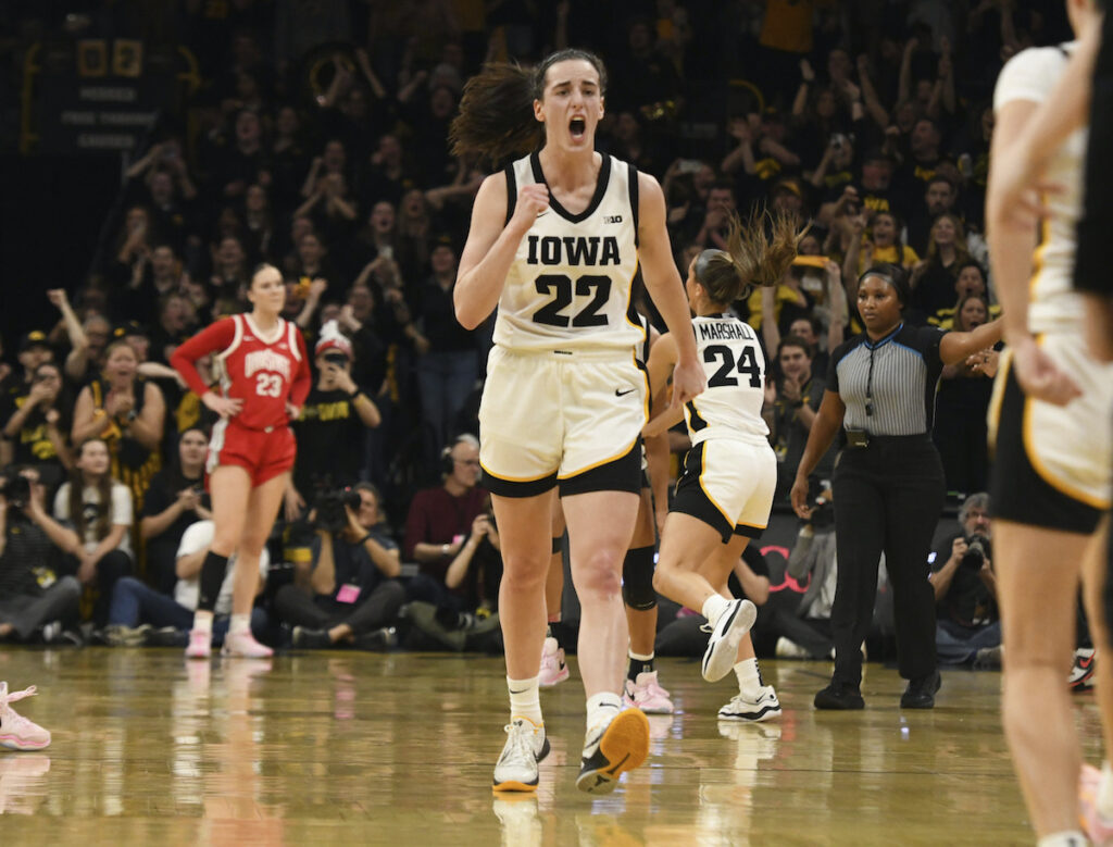 Ohio St Iowa Basketball Iowa guard Caitlin Clark (22) celebrates after becoming the all-time leading scorer in NCAA Division I basketball during the first half of a college game against Ohio State, Sunday, March 3, 2024, in Iowa City, Iowa.