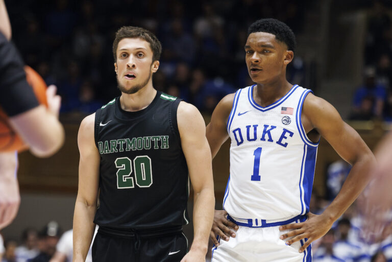 Dartmouth's Romeo Myrthil (20) stands next to Duke's Caleb Foster (1) during the second half of an NCAA college basketball game in Durham, N.C., Monday, Nov. 6, 2023. A ruling that gives the Dartmouth basketball team the right to unionize has far-reaching implications for all of college sports — from the quaint, academically oriented Ivy League to the big-money football factories like Michigan and Alabama. But it’s not time to cut down the nets just yet.