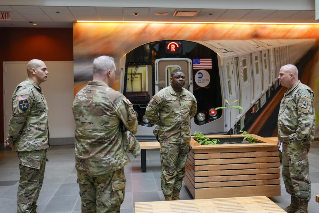 NYC Subway National Guard Members of the Armed Forces including the National Guard wait in the lobby of the New York City Mass Transit Authority Rail Control Center before the start of a news conference with Gov. Hochul, Wednesday, March 6, 2024, in New York.