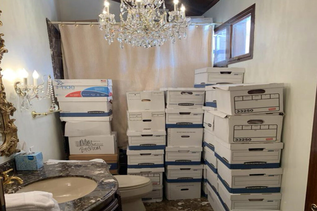 Trump Classified Documents This image, contained in the indictment against former President Donald Trump, shows boxes of records stored in a bathroom and shower in the Lake Room at Trump's Mar-a-Lago estate in Palm Beach, Fla. A federal judge is set to hear arguments on whether to dismiss the classified documents prosecution of Donald Trump. His lawyers say the former president was entitled under the Presidential Records Act to keep the sensitive documents with him when he left the White House and headed to Florida.