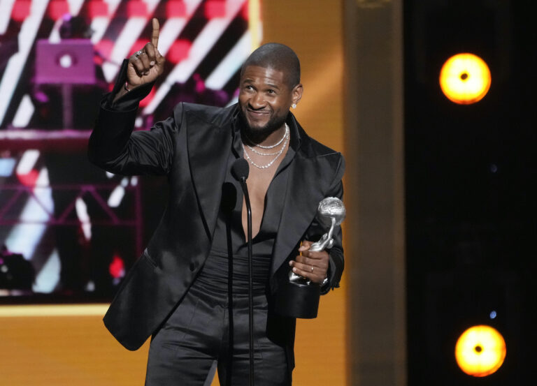 Usher addresses the audience after winning Entertainer of the Year during the 55th NAACP Image Awards, Saturday, March 16, 2024, at The Shrine Auditorium in Los Angeles.