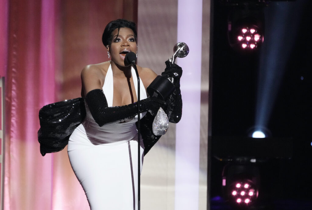 Fantasia Barrino, a cast member in ''The Color Purple,'' accepts the award for Outstanding Actress in a Motion Picture during the 55th NAACP Image Awards, Saturday, March 16, 2024, at The Shrine Auditorium in Los Angeles.
