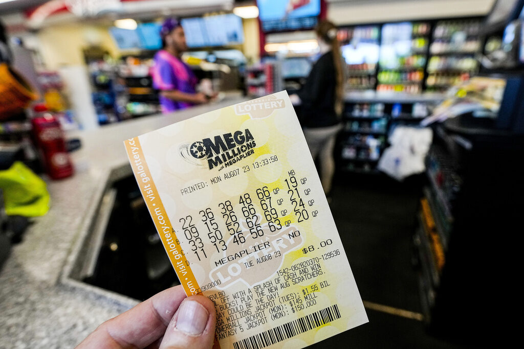 Lottery Jackpot A person holds up a lottery ticket