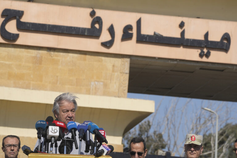 United Nations Secretary General Antonio Guterres speaks after his visit to the Rafah border crossing between Egypt and the Gaza Strip, Saturday, March 23, 2024. Arabic reads, 