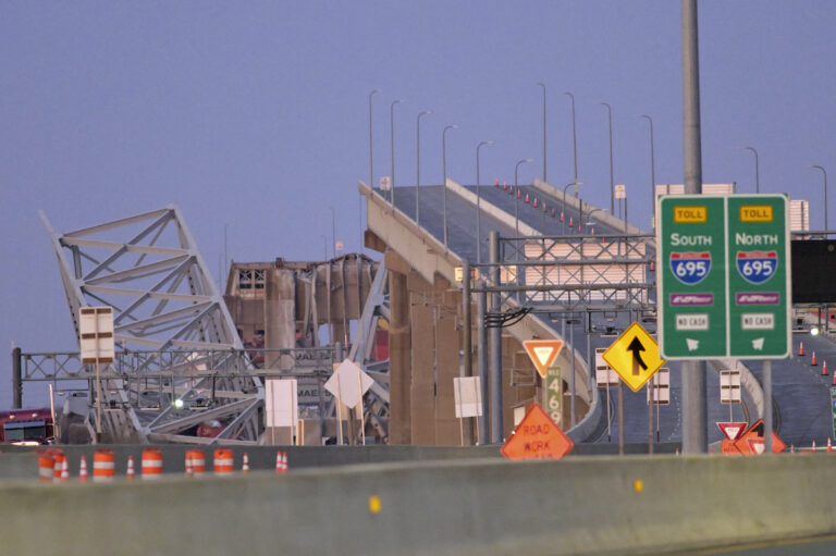 Parts of the Francis Scott Key Bridge remain after a container ship collided with a support Tuesday, March 26, 2024 in Baltimore. The major bridge in Baltimore snapped and collapsed after a container ship rammed into it early Tuesday, and several vehicles fell into the river below. Rescuers were searching for multiple people in the water.