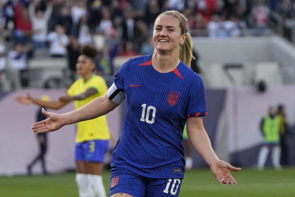 CONCACAF Brazil US Soccer Lindsey Horan celebrating on the field after scoring.