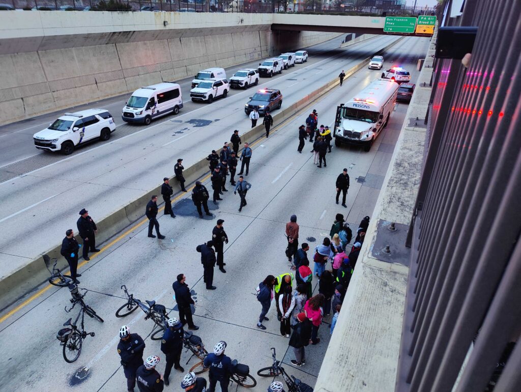 Dozens of arrests were made after a large demonstration partially shut down Interstate 676 westbound in Center City on Saturday. (Peter Crimmins/WHYY)