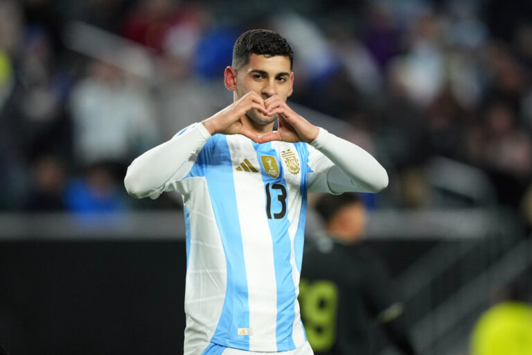 Argentina's Cristian Romero reacts after scoring a goal during the first half of a friendly soccer match