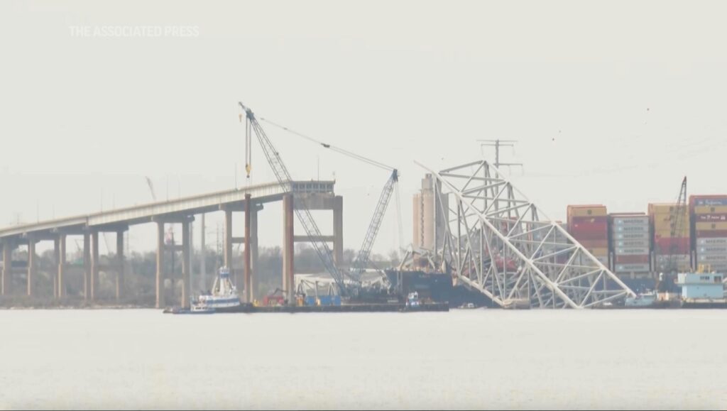 Crews have started removing first piece of twisted steel from collapsed Baltimore bridge. (Associated Press)