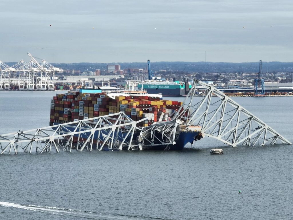 baltimore-bridge-collapse-latest A steel frame from the collapsed Francis Scott Key bridge
