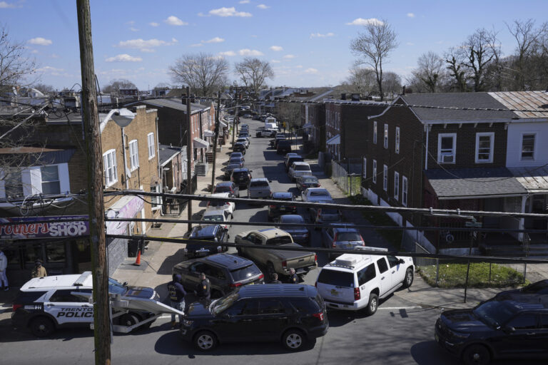 An aerial view of cars blocking off a street in Trenton, New Jersey where a suspected shooter barricaded himself