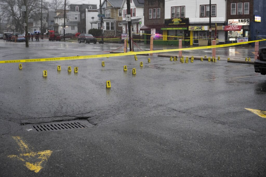 Evidence markers are seen following a shooting in Northeast Philadelphia