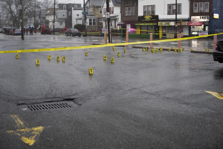 Evidence markers are seen following a shooting in Northeast Philadelphia