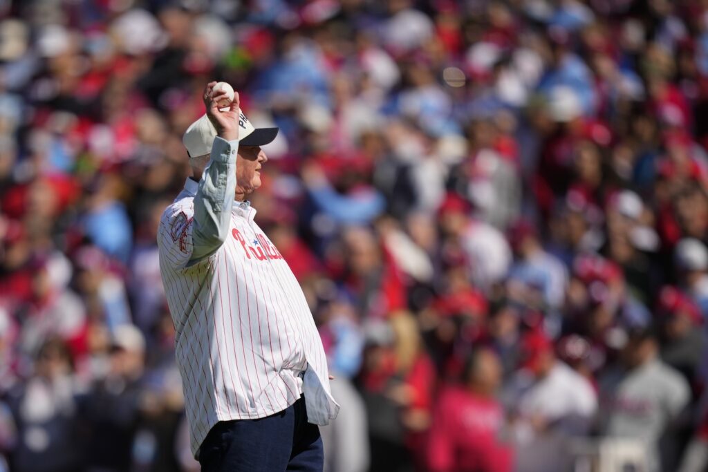 Former Philadelphia Phillies manager Charlie Manuel throws out a ceremonial first pitch ahead of an opening day baseball game between the Philadelphia Phillies and the Atlanta Braves, Friday, March 29, 2024, in Philadelphia.