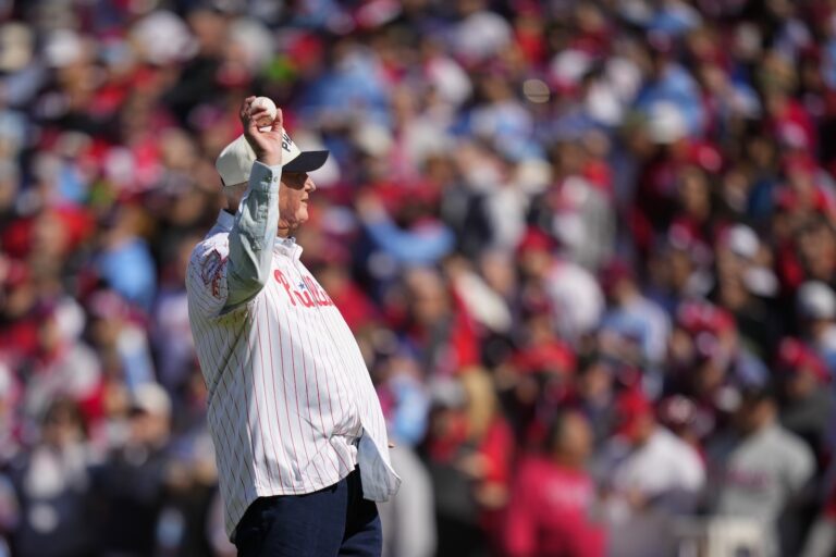 Former Philadelphia Phillies manager Charlie Manuel throws out a ceremonial first pitch ahead of an opening day baseball game between the Philadelphia Phillies and the Atlanta Braves, Friday, March 29, 2024, in Philadelphia.