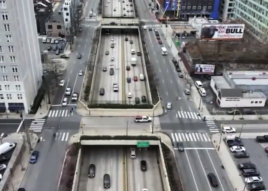 chinatown-stitch-676-6abc-2024-03-11 An aerial view of I-676 in Chinatown