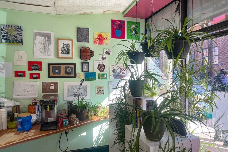 Various works of art on display at the Creative Vision Factory. (Cris Barrish/WHYY)
