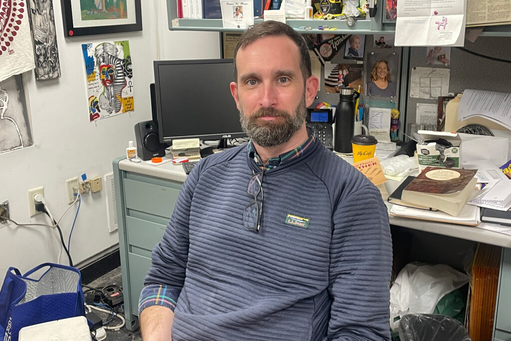 Michael Kalmbach sitting in his office