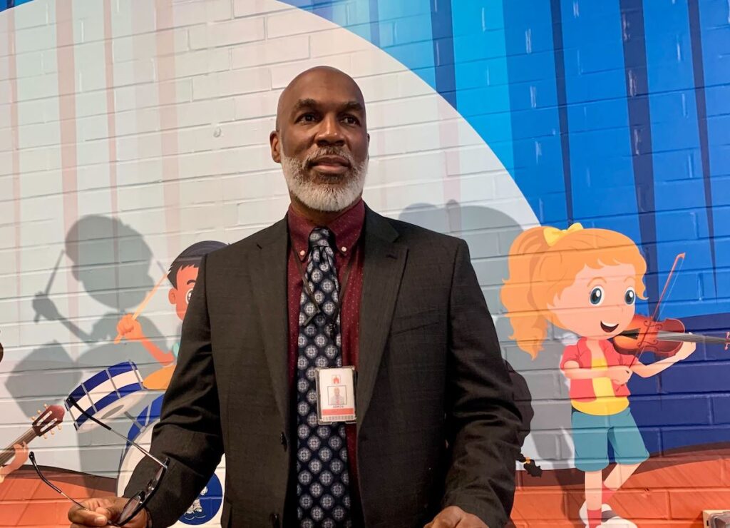 Dorrell Green speaks at a podium.