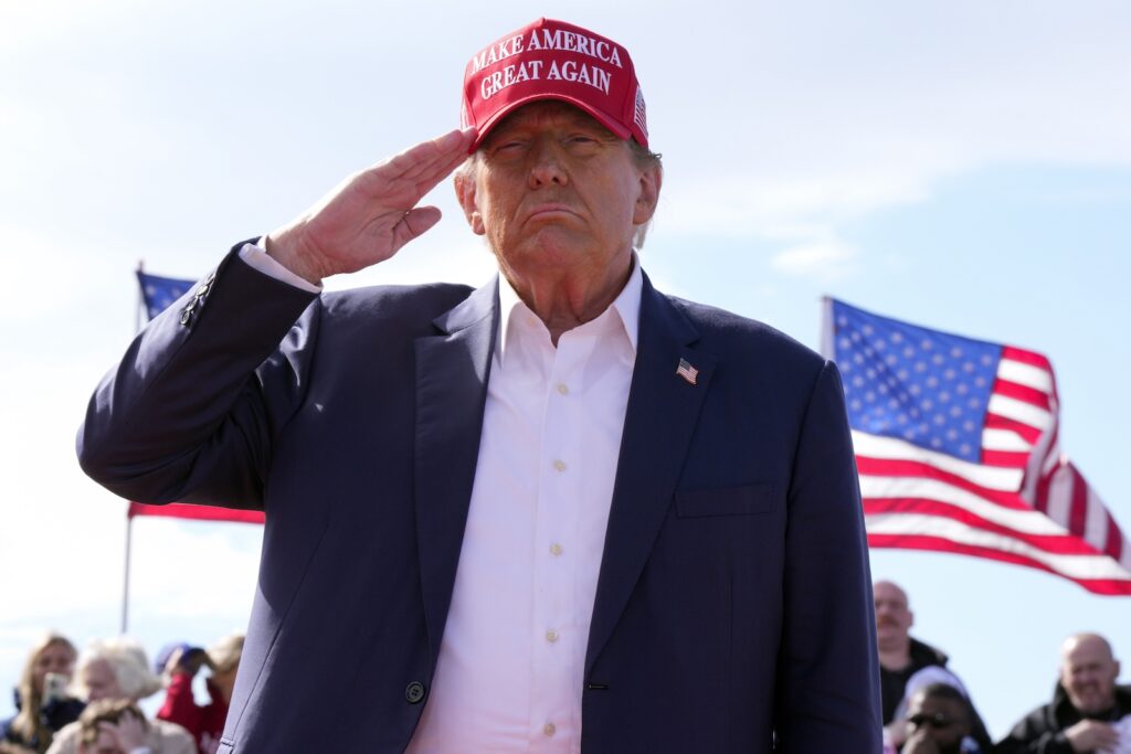 Election 2024 Trump Capitol Riot Republican presidential candidate former President Donald Trump salutes at a campaign rally March 16, 2024, in Vandalia, Ohio.