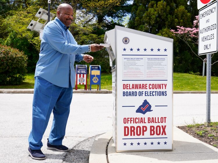 David Harrison drops off his mail ballot for the Pennsylvania primary election in Newtown Square, Pa., Monday, May 2, 2022.