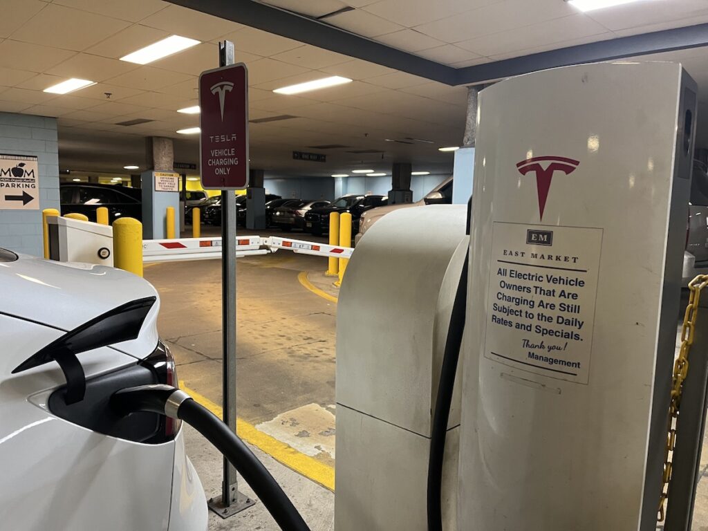 ev-charging-center-city-3 A car hooked up to a charger