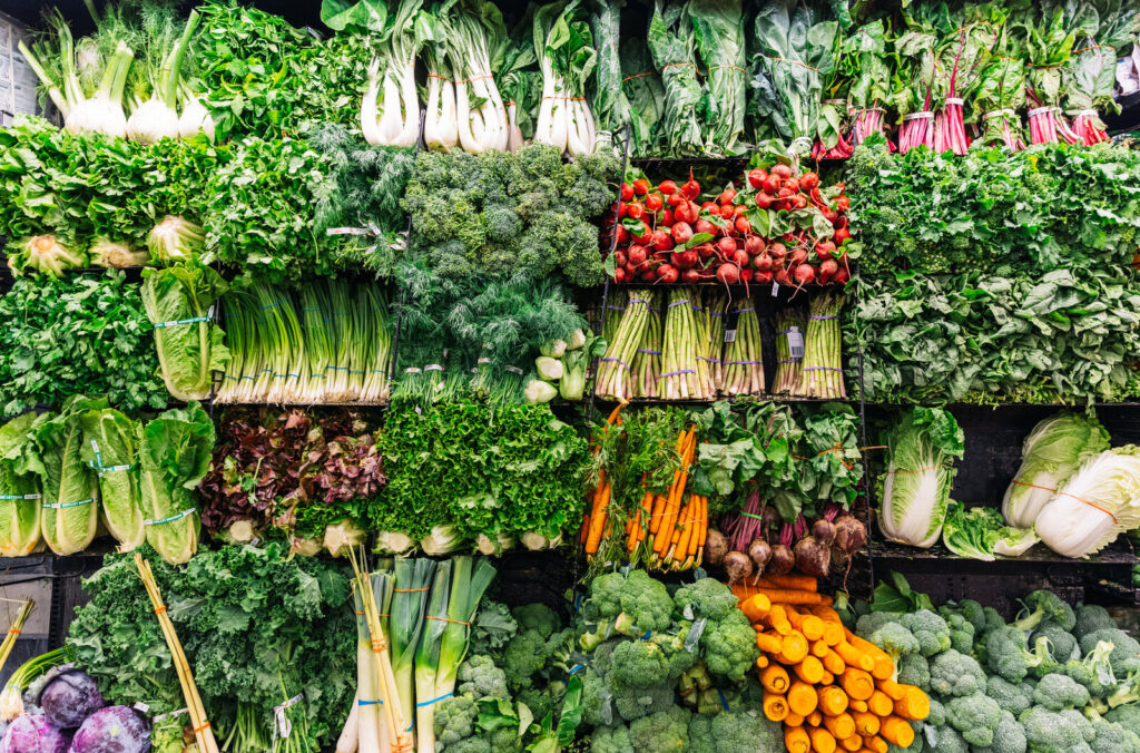 Fresh greens and vegetables on a display in a supermarket A plant-based diet is not just good for your health, it's good for the planet. (Alexander Spatari/Getty Images)