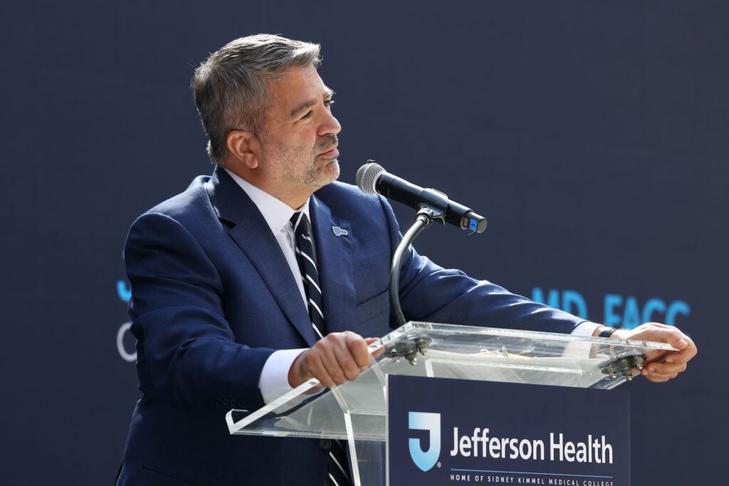 Joseph G. Cacchione speaks at a podium