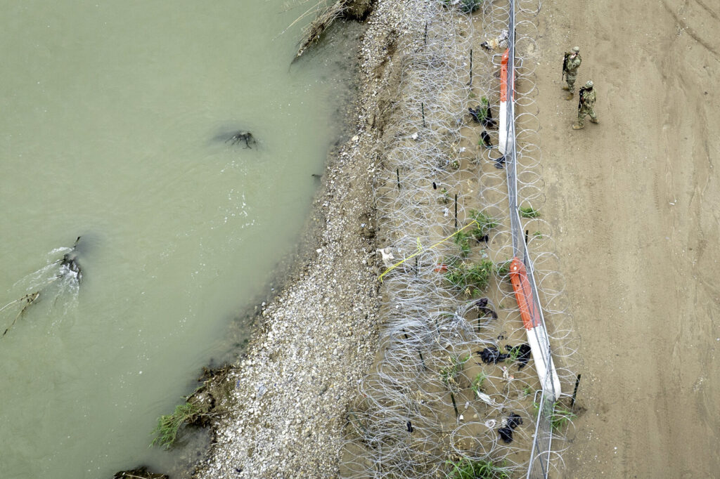 Panoramic View Of The Borderlands: Southwestern U.S. And Mexico Aerial view from above of Texas National Guard soldiers are seen guarding the U.S.-Mexico border in Eagle Pass, Texas.