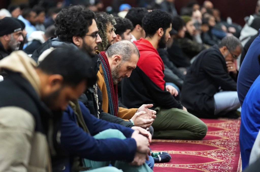 islamic-center-detroit-ap-2024-03-10 Muslim men at the Islamic Center