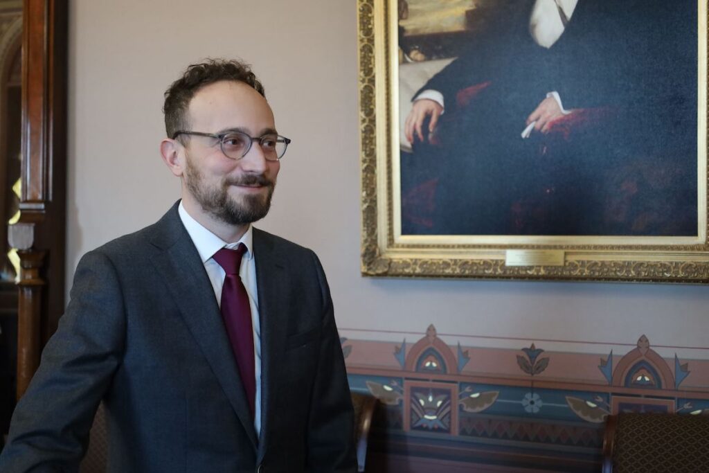 Jon Donenberg smiles while speaking to a reporter