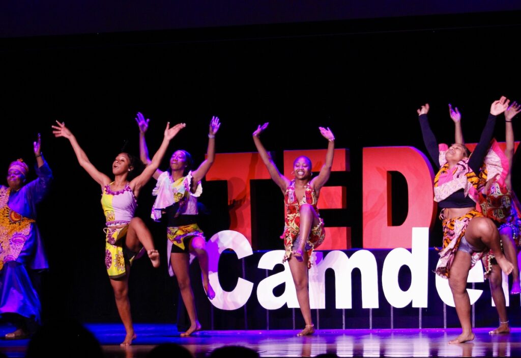 dancers perform onstage