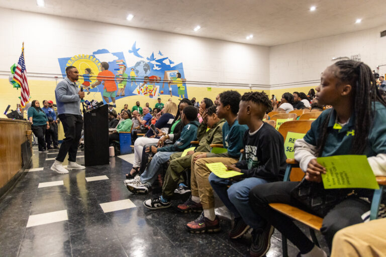 Eagles QB Jalen Hurts speaking to students at Edward Gideon Elementary School