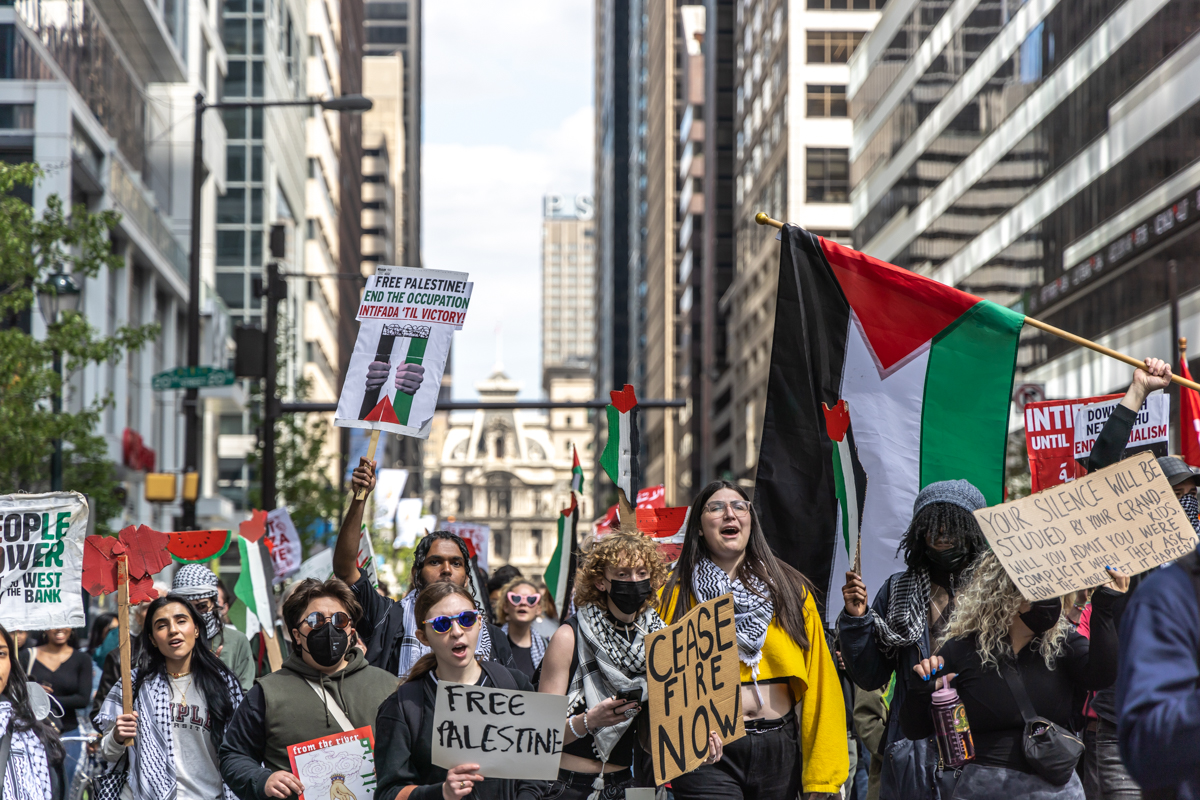Philadelphia Temple, Drexel and UPenn students marched west on Market Street to the campus of the University of Pennsylvania to protest U.S. support of Israel in the Gaza war on April 25, 2024. (Kimberly Paynter/WHYY)