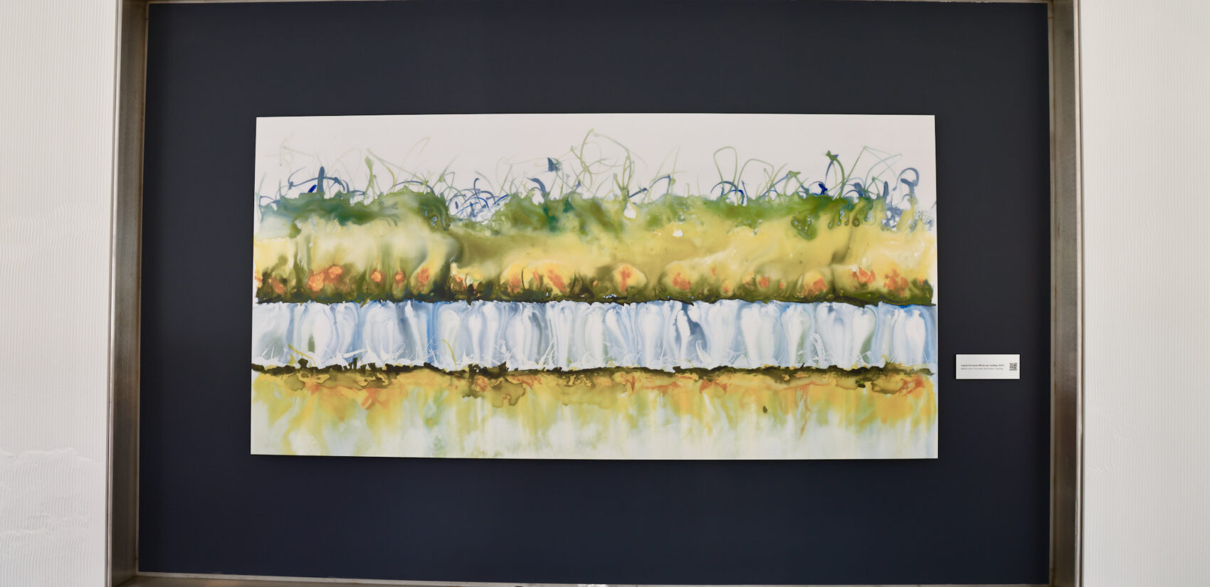 an artwork titled Liquid Horizons Number 8 hangs on a wall
