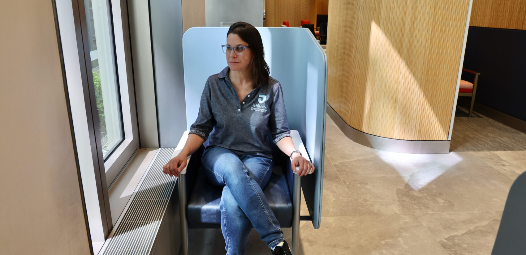 Dr. Wendy Ross sits in a chair