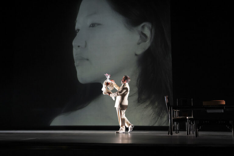 A set for Madame Butterfly shows projections of actors