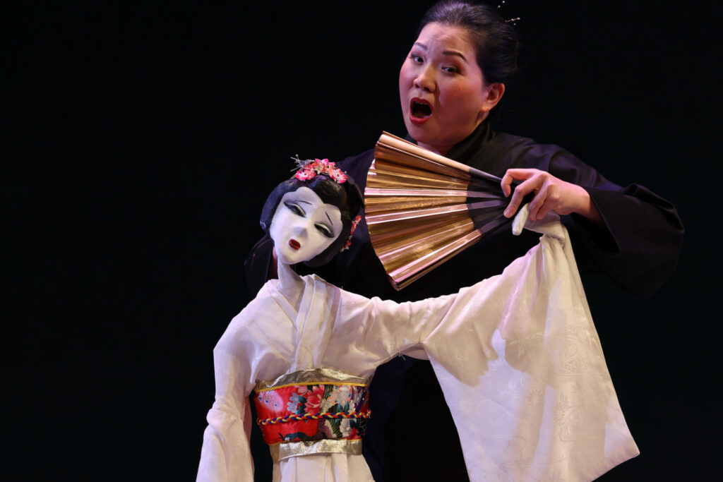 2024 04 22-e lee-karen chia ling ho-philadelphia academy of music-opera philadelphia madame butterfly fan The title role of Madame Butterfly in Opera Philadelphia's production is represented by a puppet, voiced and manipulated by Karen Chia-ling Ho.