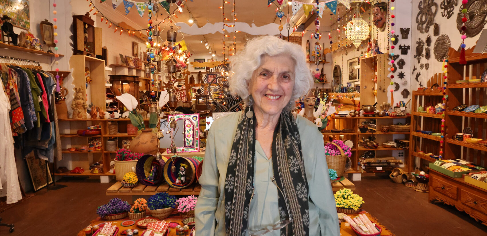 Julia Zagar stands at the entrance to the new Eyes Gallery